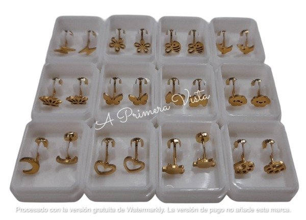 Producto - Abridor formas dorados c/par