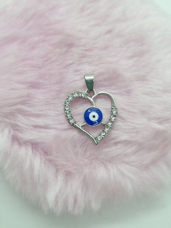 Producto - Dije acero quirurgico corazon calado ojo turco strass