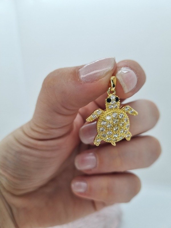 Producto - Dije acero dorado tortuguita strass