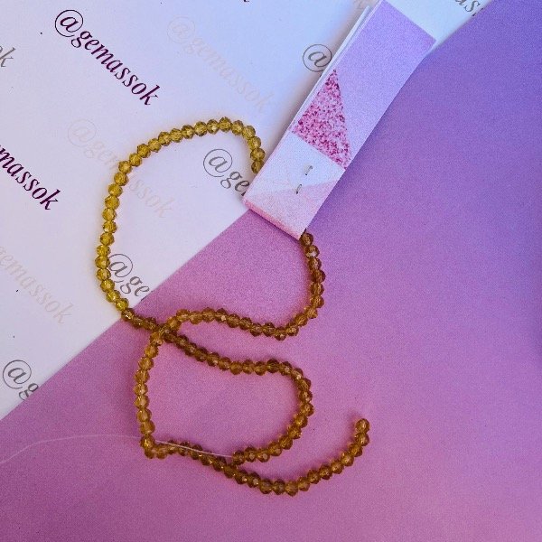 Producto - Roca 6mm Dorado translúcido