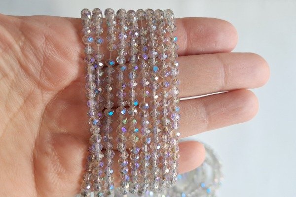 Producto - Cristal de Roca Gris Traslúcido Tornasol 4 mm