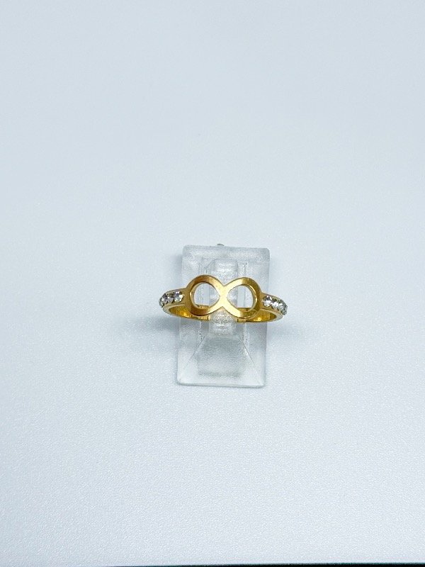 Producto - Anillo acero dorado infinito con strass