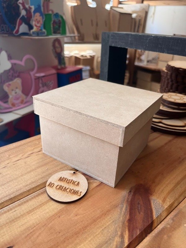 Producto - 10 CAJA 12X12X8 CON TAPA