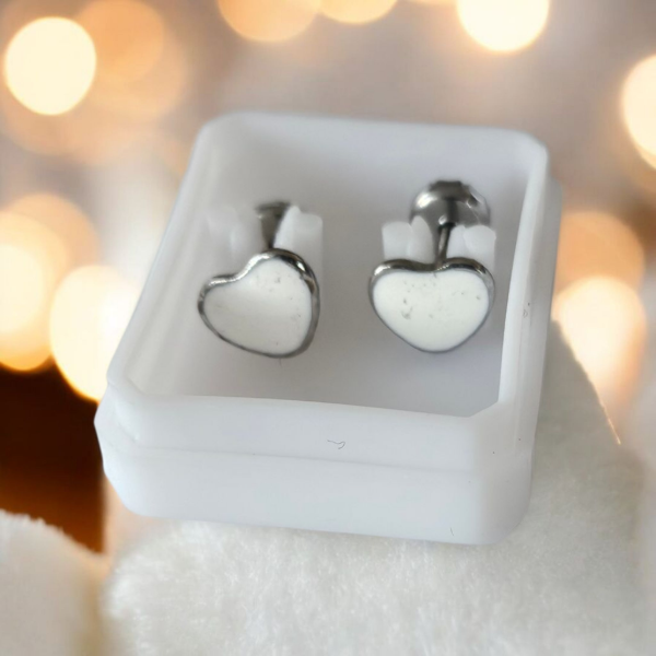 Producto - Abridor acero corazon blanco