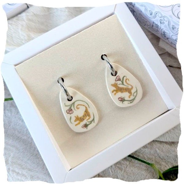 Producto - aritos TIGRES