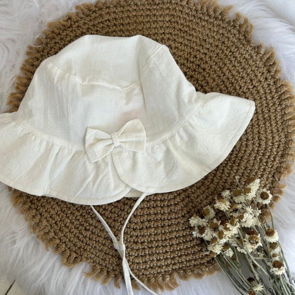 Producto - Capelinas lisas con moño hasta 7 años aprox