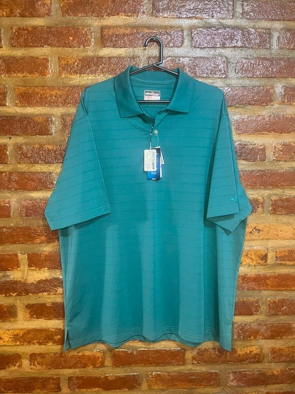 Producto - CHOMBA GRAND SLAM