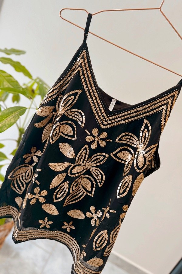 Producto - MUSCU REINIS