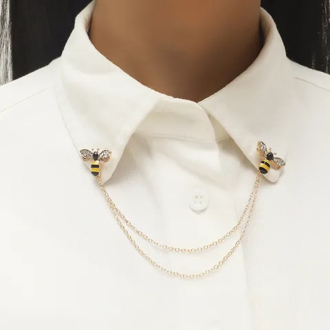 Producto - Prendedor Tuxi