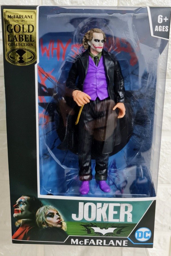 Producto - Figura Joker guason 18 cm con base edición limitada traje negro con arma