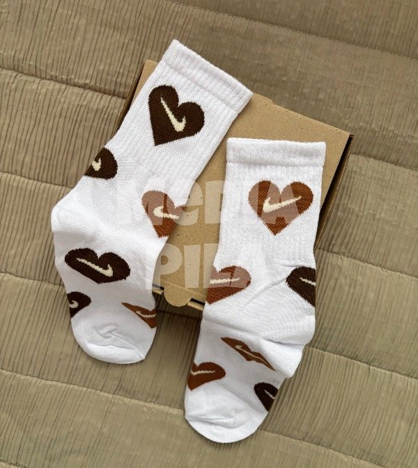 Producto - Media caña - Nike corazones