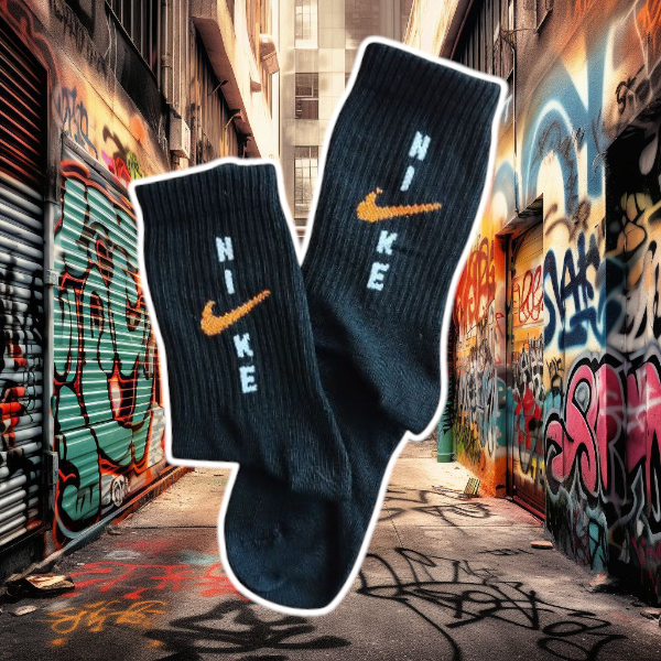 Producto - Nike negra pipa naranja