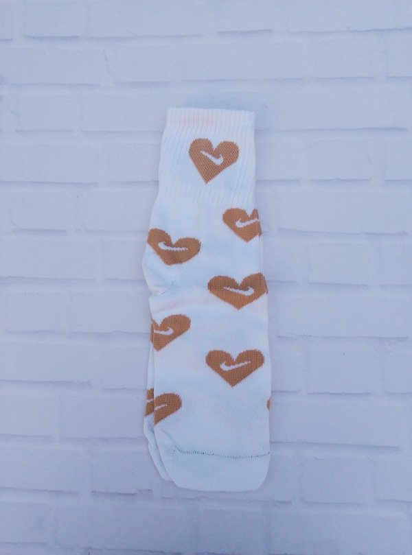 Producto - Nike Corazón Dorado