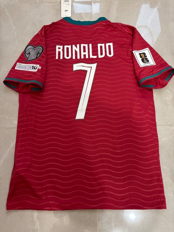 Producto - Portugal local 2026 Versión Hincha Eliminatorias 2026 7 Ronaldo
