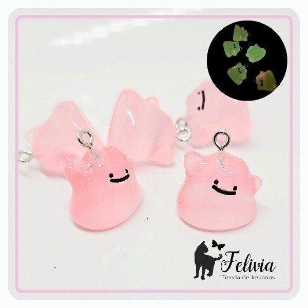 Producto - Dije Pokemon Ditto luminoso. Rosa