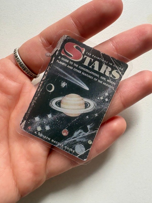 Producto - sticker libreta universo