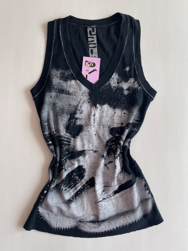 Producto - musculosa tucci