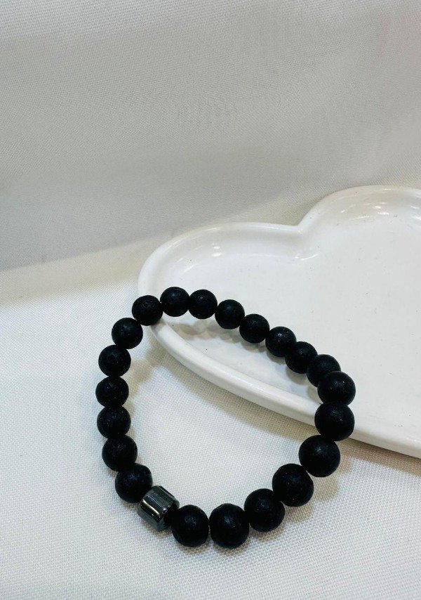 Producto - Pulsera negra pelotitas naturales