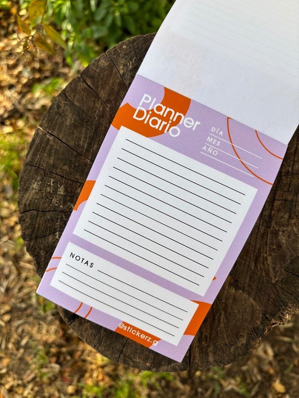 Producto - ANOTADOR VIOLETA Y NARANJA