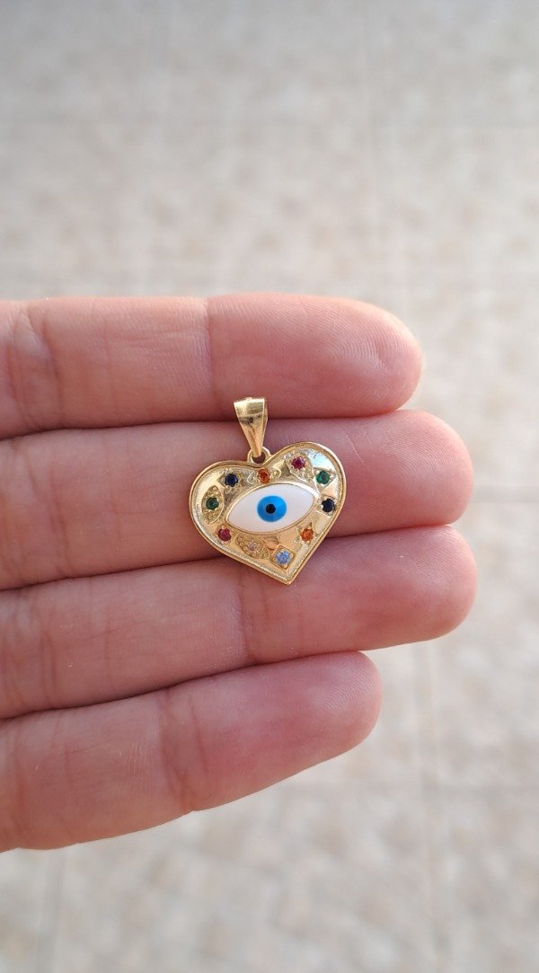 Producto - Dije de Plata con Baño Dorado Corazón 18mm con Ojo y Strass colores