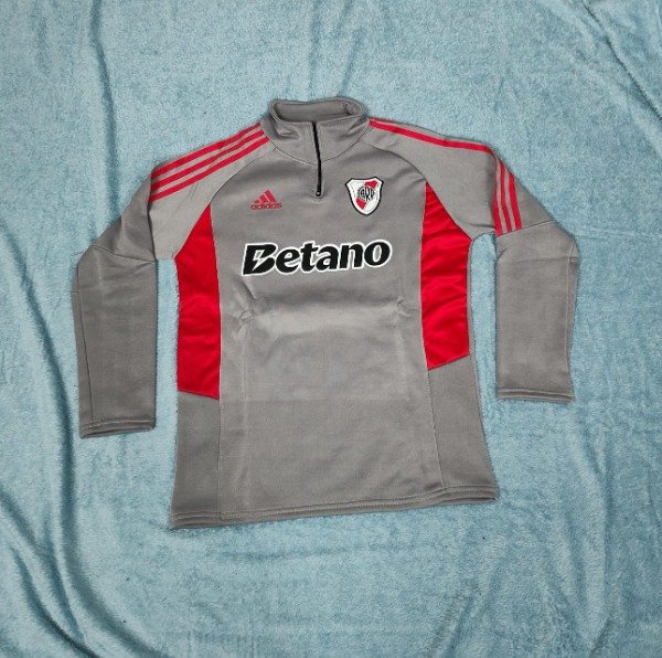 Producto - BUZO MEDIO CIERRE RIVER GRIS