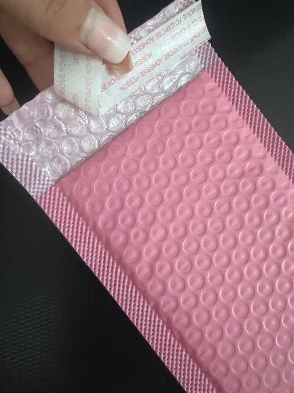 Producto - 50 sobres burbujitas rosa pegamento y sticker de regalo 15 x 13 cm