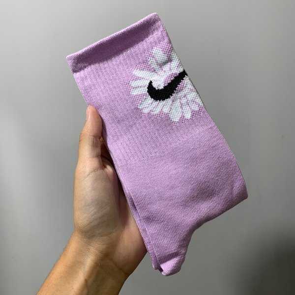 Producto - Media caña Nike lila flor blanca