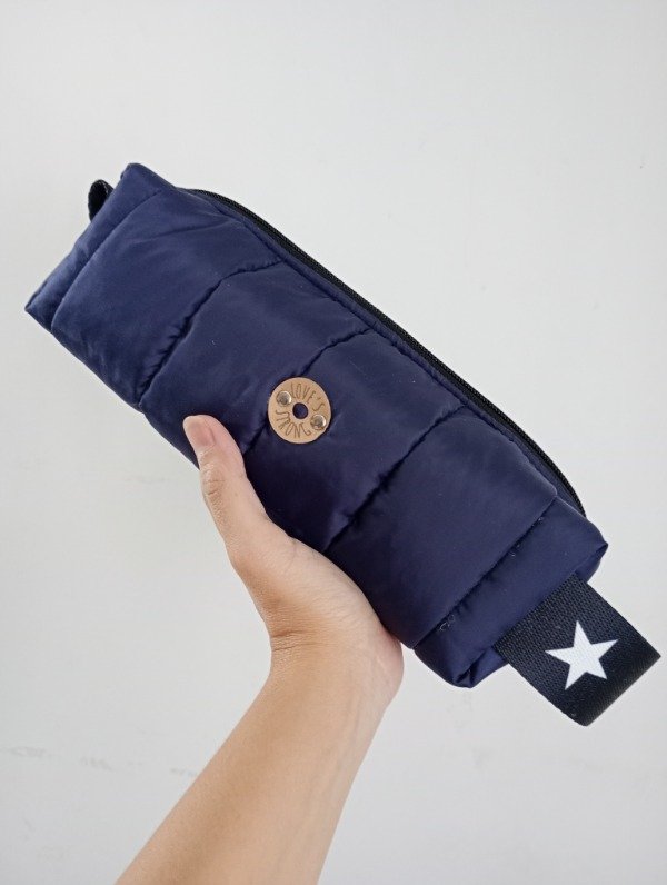 Producto - Cartuchera/neceser pufer azul marino /estrellas STOCK