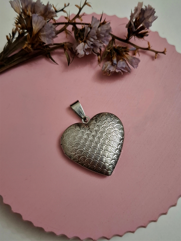 Producto - Dije Relicario arcoiris