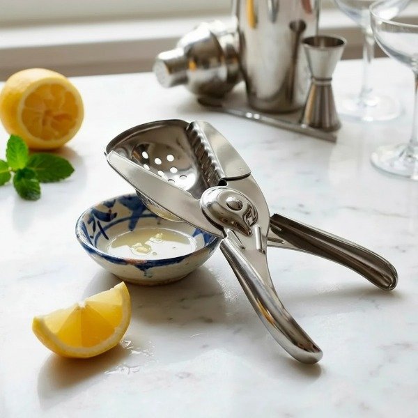 Producto - EXPRIMIDOR MANUAL DE CITRICOS TIPO PINZA DE METAL