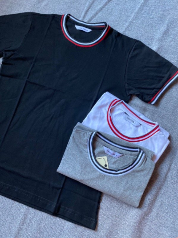 Producto - Remera con puño