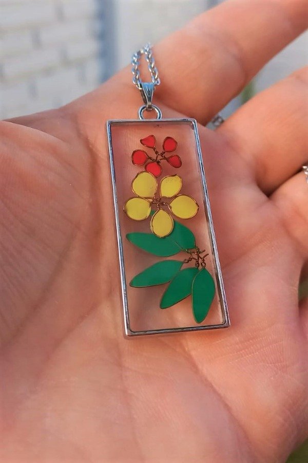 Producto - Dije Flores vitrificadas.