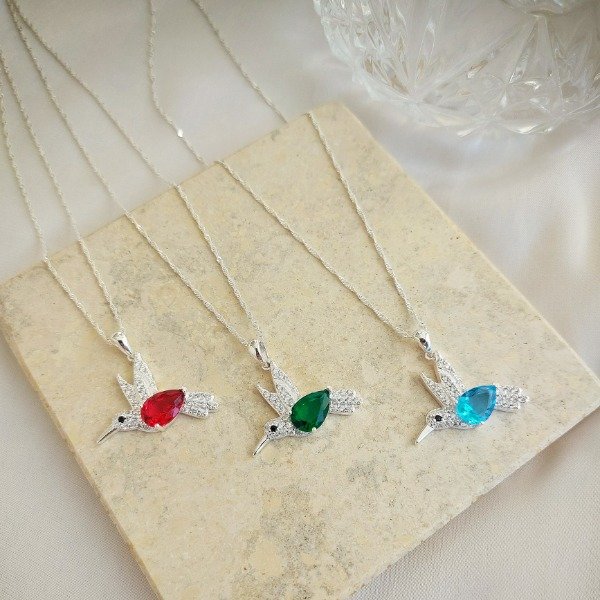 Producto - Dije colibrí  celeste m. pave