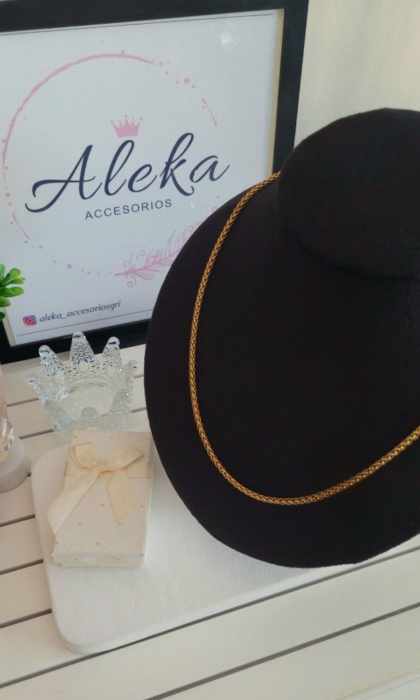 Producto - Cadena estilo espiga de acero dorado
