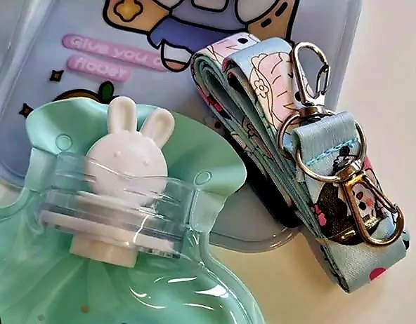 Producto - Mini bolsita agua caliente de mano con correa