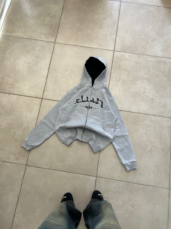 Producto - ZIP HOODIE OVER ARABIC GRIS MELANGE