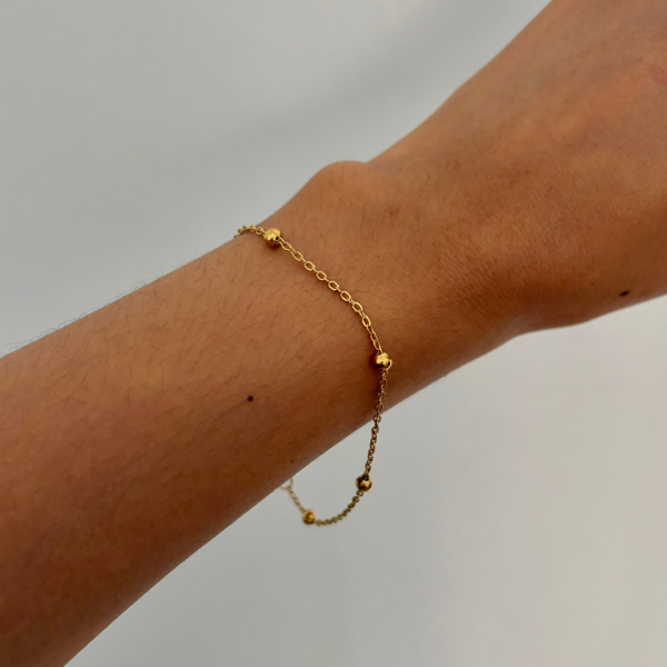 Producto - Pulsera perlitas doradas