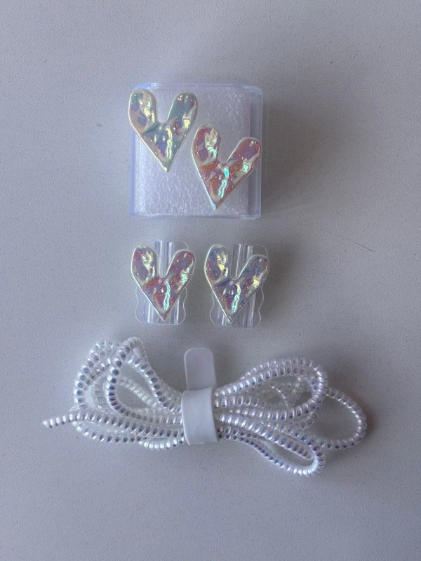 Producto - Protector para cargador Iphone 20w completo corazones holograficos
