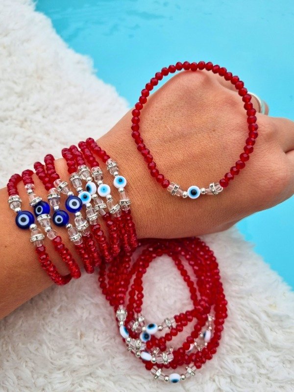 Producto - PULSERA CRISTAL ROJO CON OJITO Y STRASS