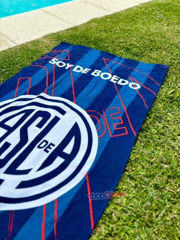 Producto - TOALLÓN PLAYERO RECTANGULAR SAN LORENZO CON MOCHILA