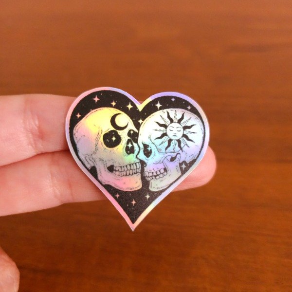 Producto - 4CM TORNASOLADO UV CORAZON CALAVERAS SOL Y LUNA