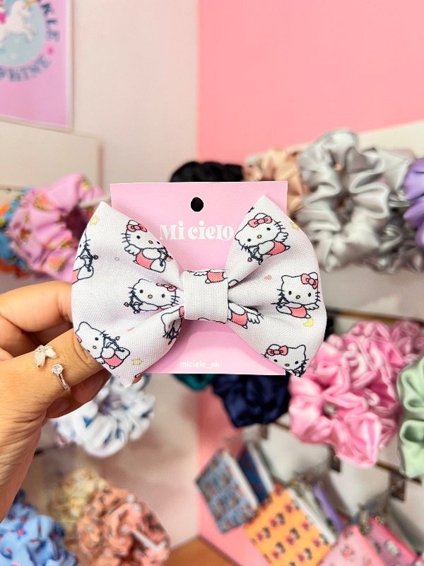 Producto - MOÑO HELLO KITTY CUPIDO