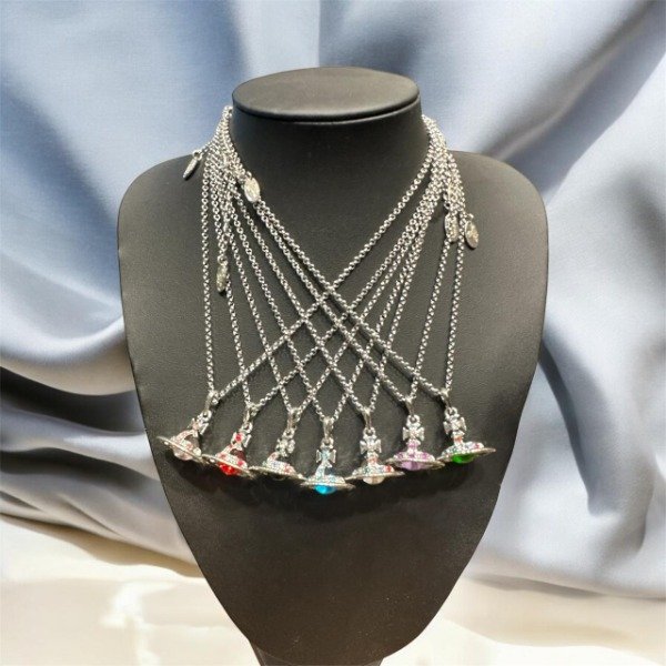 Producto - DIJES SATURNO VIVIENNE WESTWOOD VARIOS COLORES