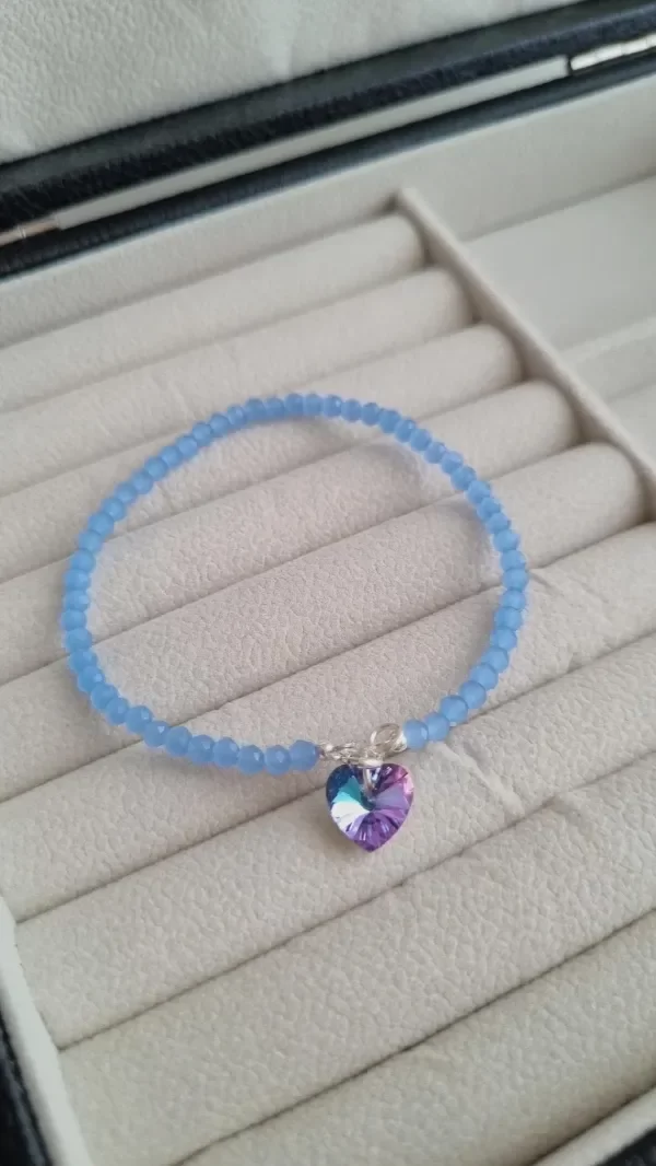 Producto - Pulsera celeste con corazon lila tornasol plata 925