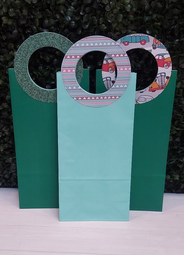 Producto - Sobre-bolsa de papel con fuelle y manijas texturadas 3