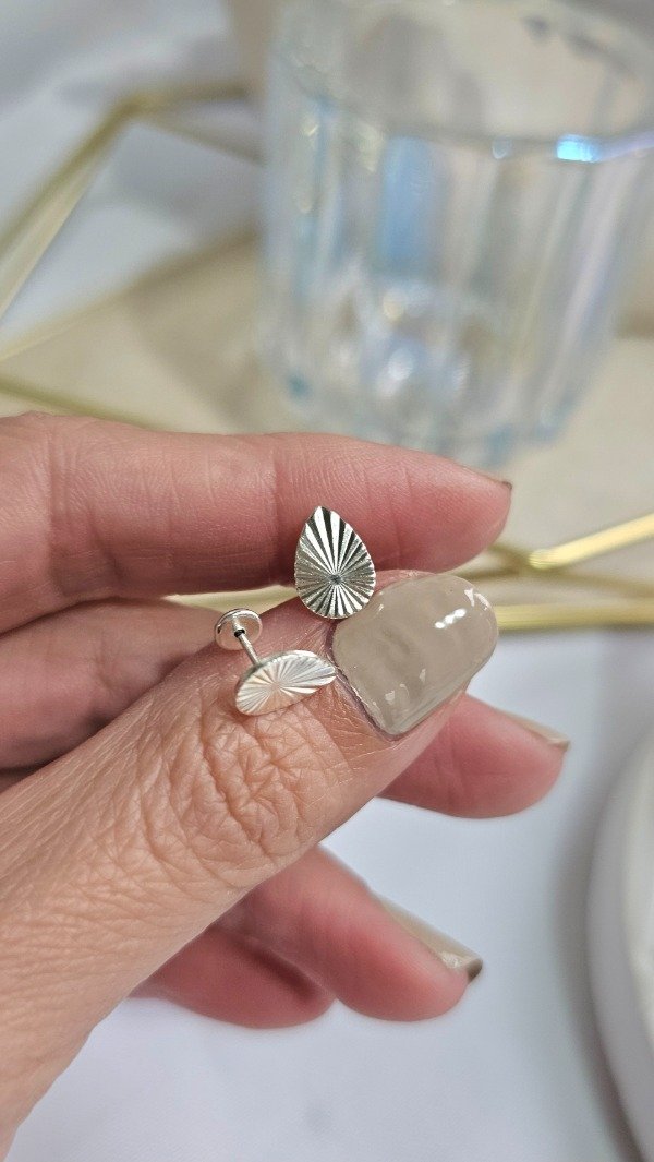 Producto - Abridor gota facetada. Plata