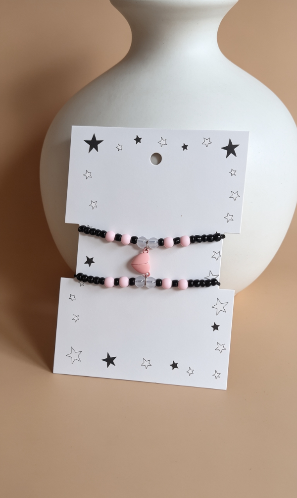 Producto - Pulseras compartidas con imán corazón rosa