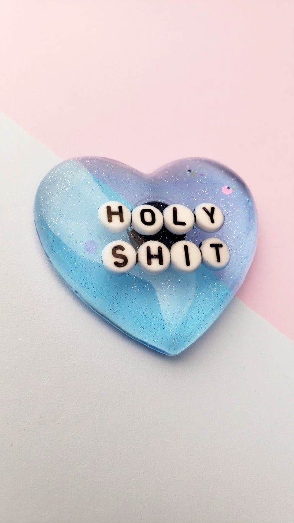 Producto - Iman - Holy Shit (celeste)
