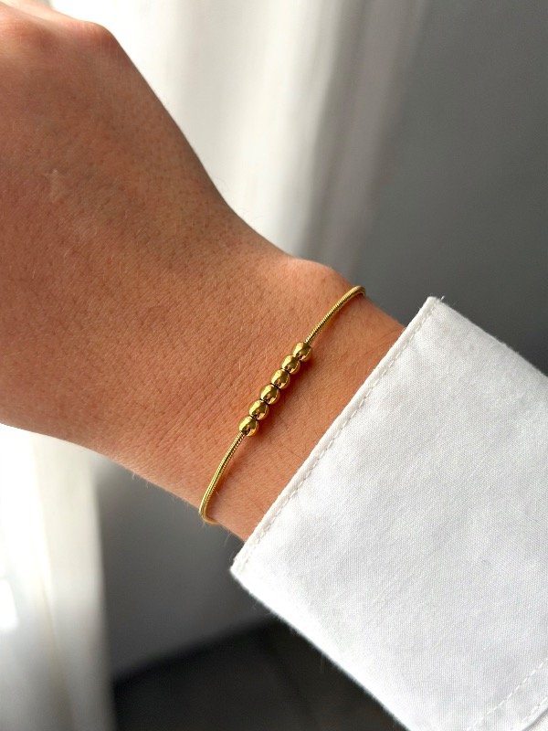 Producto - Pulsera dorada fina balls