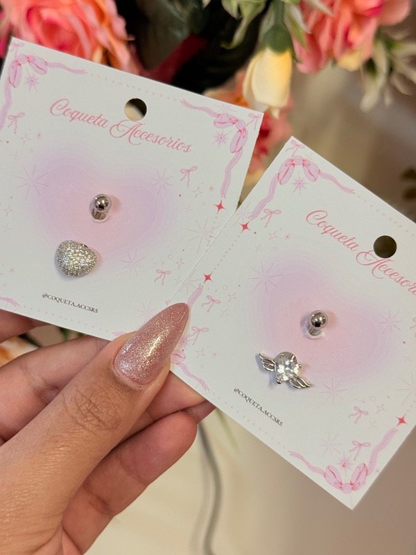 Producto - Pircing corazón con alas y corazones destello